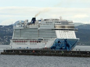 The Norwegian Bliss, which is powered by diesel, makes its way towards Ogden Point in Victoria on June 1, 2018