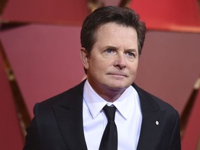 In this Feb. 26, 2017, file photo, Michael J. Fox arrives at the Oscars at the Dolby Theatre in Los Angeles.