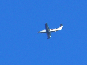 The Pilatus PC-12 that has been "loitering" over Kingston, Ont., for weeks was caught on camera on Jan. 13 by local aircraft enthusiast Neil Aird.