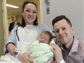 Dominik Soswa, the first baby born in BC in 2019, with his parents Janet Shimizu and Lukasz Soswa at Royal Columbian Hospital in New Westminster.