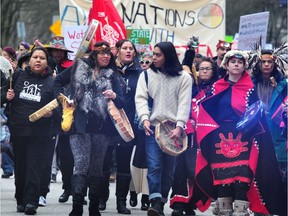An Indigenous-led march in downtown Vancouver in support of the Wet'suwet'en, who set up of a checkpoint and camp in opposition to the TransCanada Coastal GasLink pipeline, on Jan. 8, 2019.