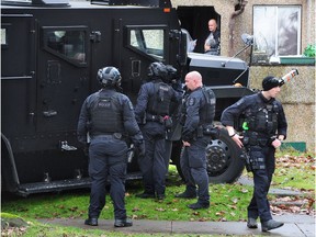 Vancouver Police surround a house in the 200 block 49th Ave near Langara Golf Course, in Vancouver, BC., January 10, 2019.