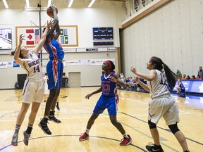 The Brookswood Bobcats of Langley played the Semiahmoo Totems in last year's Triple-A provincial girls basketball tournament.