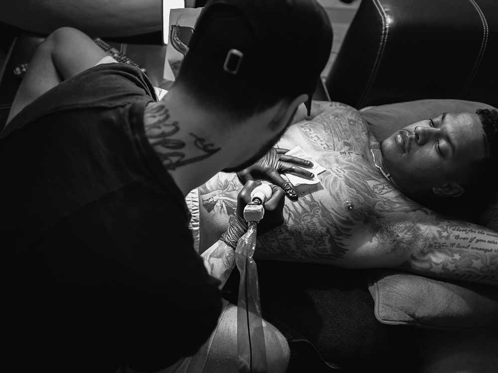 B.C. tattoo artist inks Toronto skyline on Blue Jays pitcher