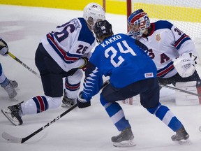 Kaapo Kakko, pictured driving toward the net in the second period, got a late golden goal to lift Finland to a 3-2 win over Team USA Saturday at Rogers Arena in Vancouver.
