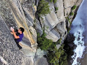 Alex Honnold makes the first free solo ascent of El Capitan's Freerider in Yosemite National Park.