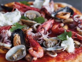 Mussels, clams, prawns, crabmeat and baby squid elevate this pizza. Once the dough is ready and the oven is hot, you can make it in well under an hour.