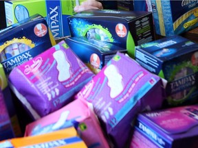 The New Westminster school board has voted in favour of supplying free pads and tampons in restrooms at the district's schools.