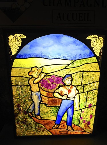 Grape harvest mural inside C Comme Champagne (a specialist Champagne bar and boutique in Épernay).