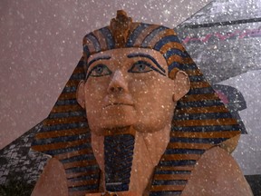 Snow falls on a replica Sphinx head at Luxor Hotel and Casino during a winter storm on February 20, 2019 in Las Vegas, Nevada.