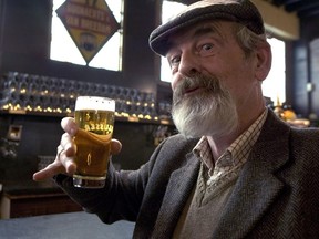 A local enjoys a beer inside the Het Anker brassiere, Mechelen.