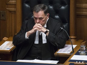 House Speaker Darryl Plecas pauses for a moment before Lieutenant Governor Janet Austin delivers the speech from the throne in the B.C. Legislature in Victoria on Tuesday.