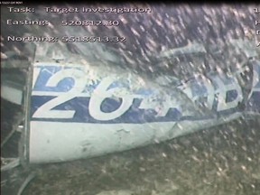 In this image released Monday Feb. 4, 2019, by the UK Air Accidents Investigation Branch showing the rear left side of the fuselage including part of the aircraft registration N264DB that went missing carrying soccer player Emiliano Sala, when it disappeared from radar contact on Jan. 21 2019.