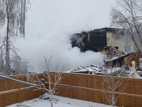 Aftermath of a house explosion is shown in Calgary, Alta., Sunday, Feb.17, 2019 in a handout photo. A house was destroyed when a fire broke out following an apparent explosion in Calgary early Sunday, officials said, and several hours later firefighters were still unable to enter the building to check if anyone was home at the time.