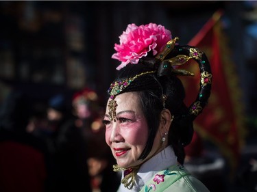 Dressed as a fairy, Fanny Lam participates in the Chinese New Year Parade in Vancouver on Sunday, Feb. 10, 2019. More than 3,000 people participated in the parade according to organizers and more than 100,000 spectators were expected to line the parade route.