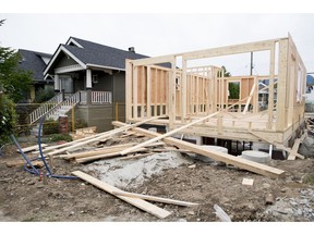 A new home is pictured being built in Vancouver, B.C., Tuesday, June, 12, 2018.