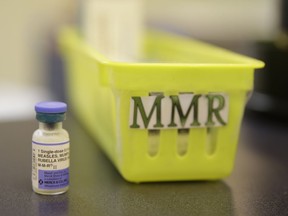 A measles, mumps and rubella vaccine is seen on a countertop at a pediatrics clinic in Greenbrae, Calif. on Feb. 6, 2015. The Public Health Agency of Canada has issued a statement aimed at reminding Canadians that measles is a serious and highly contagious disease and that getting vaccinated is the best protection.
