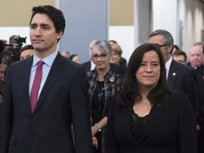 Prime Minister Justin Trudeau and Minister of Justice and Attorney General of Canada Jody Wilson-Raybould take part in the grand entrance as the final report of the Truth and Reconciliation commission is released, Tuesday December 15, 2015 in Ottawa. Veterans Affairs Minister Jody Wilson-Raybould is quitting the federal cabinet days after allegations became public the Prime Minister's Office pressured the former justice minister to help SNC-Lavalin avoid criminal prosecution.