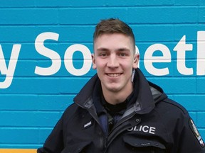 Transit Police Const. Josh Harms has returned to duty three months after being shot in both arms at Scott Road SkyTrain station.