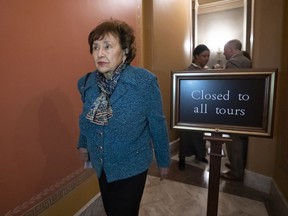 House Appropriations Committee Chair Nita Lowey, D-N.Y., walks to a closed-door meeting with the bipartisan group of House and Senate negotiators trying to negotiate a border security compromise in hope of avoiding another government shutdown, at the Capitol in in Washington, Monday night, Feb. 11, 2019.