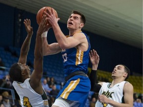 UBC guard Mason Bourcier drives to the net, from game action between UBC Thunderbirds and University of Northern B.C. Timerwolves during U Sports Canada West action at UBC in Vancouver on Jan. 26, 2019.