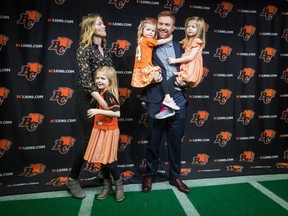 B.C. Lions quarterback Travis Lulay, with wife Kim and their daughters, from left to right, Parker, 6, Jade, 3, and Everly, 4. Lulay announced his retirement on Thursday in Surrey.