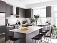 Dark, cool tones add a sophisticated elegance to the Osler Residences display kitchen.