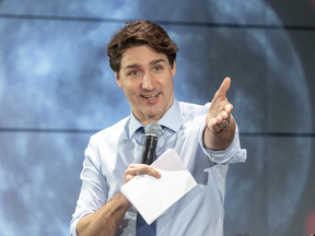 Prime Minister Justin Trudeau speaks to high school students at the Canadian Space Agency headquarters, Feb. 28, 2019 in St. Hubert, Quebec.
