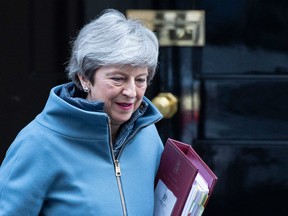 Britain's Prime Minister Theresa May leaves 10 Downing street in central London on February 20, 2019 ahead of Prime Minister's Questions (PMQs).