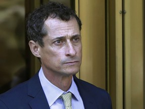 FILE - In this Sept. 25, 2017 file photo, former Congressman Anthony Weiner leaves federal court following his sentencing in New York. Weiner has been released from federal prison in Massachusetts. The New York Democrat, a once-rising star who also ran for mayor, was convicted of having illicit online contact with a 15-year-old North Carolina girl in 2017. The Federal Bureau of Prisons website now shows Weiner is in the custody of its Residential Re-entry Management office in Brooklyn, New York. It's not immediately clear when he was transferred and where he's currently staying. The bureau, federal court in New York and Weiner's lawyer didn't immediately comment.