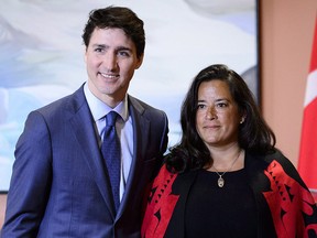 Prime Minister Justin Trudeau and Veterans Affairs Minister Jodie Wilson-Raybould attend a swearing in ceremony at Rideau Hall in Ottawa on Monday, Jan. 14, 2019.