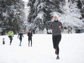 PORT MOODY, B.C.: FEBRUARY 13, 2019 – People enjoy the snowy landscape at Rocky Point Park in Port Moody, B.C. Wednesday ON February 13, 2019.