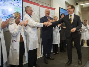 B.C. Premier John Horgan and health minister Adrian Dix announce the go-ahead for the new St. Paul's hospital to be be built on Station Street in the False Creek Flats in Vancouver at a press conference on Feb. 15, 2019.