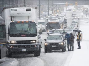 TransLink says the snow is causing some delays on transit Thursday.