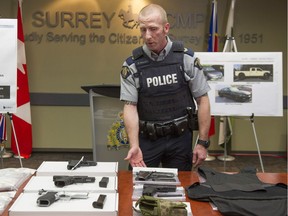 Surrey RCMP display seized guns during a 2017 investigation.