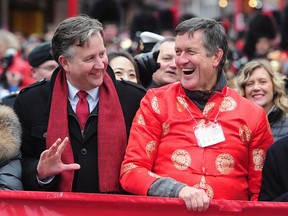 Vancouver Mayor Kennedy Stewart (l) and Svend Robinson at the 46th Vancouver Chinatown Spring Festival Parade in Vancouver on February 10.