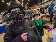 Brad Ellis and his 10-year-old son Logan at the Vancouver Comic and Toy Show at the PNE Forum on Sunday. Arlen Redekop/PNG