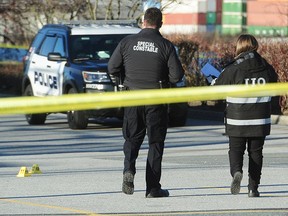 NEW WESTMINSTER, BC., February 25, 2019 -- Independent Investigation Officers (IIO) and New Westminster police investigate after officers were called to a report of a suicidal man, possibly carrying a firearm, at the rear of a Walmart store in the Queensborough neighbourhood, in New Westminster, BC., February 25, 2019. Shots were fired as officers arrived and the man died of his injuries.