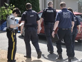 Coquitlam RCMP and the Integrated Homicide Investigation Team (IHIT) investigate a double homicide in Coquitlam BC., July 17, 2015.
