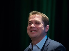 Conservative Leader Andrew Scheer smiles while listening to a question during a Surrey Board of Trade event, in Surrey, B.C., on Friday February 1, 2019.