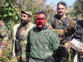 Indian pilot Abhi Nandan escorted away after being captured by the Pakistani military on Feb. 27, 2019.