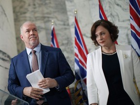 B.C. Premier John Horgan and Energy Minister Michelle Mungall announced Thursday that funds will flow to B.C. Hydro to limit rate hikes due to the utility overpaying on private power projects.