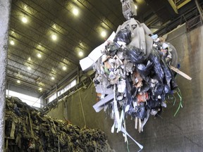 A refuse crane sorts the solid waste destined for the incinerator at the Waste to Energy facility in Burnaby in 2008.