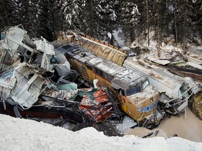 A train derailment is shown near Field, B.C., Monday, Feb. 4, 2019. A union representative says a Canadian Pacific freight train fell more than 60 metres from a bridge near the Alberta-British Columbia boundary in a derailment that killed three crew members.