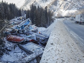 A train derailment is shown near Field, B.C., Monday, Feb. 4, 2019. A union representative says a Canadian Pacific freight train fell more than 60 metres from a bridge near the Alberta-British Columbia boundary in a derailment that killed three crew members. The westbound freight jumped the tracks Monday at about 1 a.m. near Field, B.C.