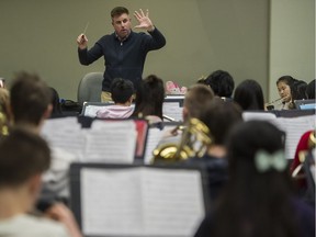 Doug Macaulay, principal conductor and program director of the West Vancouver Youth Band, took over a rag-tag group of three dozen students 26 years ago and has turned it into a thriving program with more than 200 young musicians.