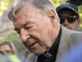 Cardinal George Pell arrives at the County Court in Melbourne, Australia, Wednesday, Feb. 27, 2019. The most senior Catholic cleric ever convicted of child sex abuse faces his first night in custody following a sentencing hearing on Wednesday that will decide his punishment for molesting two choirboys in a Melbourne cathedral two decades ago.