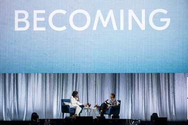 Michelle Obama with Good Morning America anchor Robin Roberts during the former U.S. First Lady's tour stop of Becoming: An Intimate Conversation with Michelle Obama in Vancouver, British Columbia on March 21, 2019.