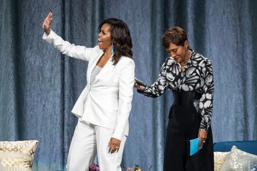 Michelle Obama with Good Morning America anchor Robin Roberts during the former U.S. First Lady's tour stop of Becoming: An Intimate Conversation with Michelle Obama in Vancouver, British Columbia on March 21, 2019.