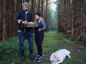 Foraging with Wolf in the Fog chef Nick Nutting and bar manager Hailey Pasemko, and their dog, Oscar.